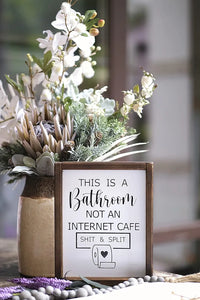 "Shit & Split" Bathroom Sign